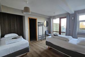 Letto o letti in una camera di Hótel Laugarvatn
