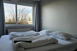 Letto o letti in una camera di Hótel Laugarvatn