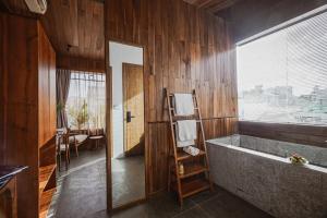 Ένα ή περισσότερα κρεβάτια σε δωμάτιο στο Nexus House Cay Diep - Near Independence Palace