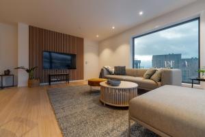 พื้นที่นั่งเล่นของ Northern Light Apartments - Nyholmen Luxury Penthouse B