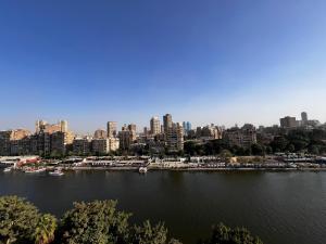 a view of a city with a large body of water at شقة بإطلالة مميزة علي النيل in Cairo