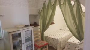 A kitchen or kitchenette at Trulli da Rosy