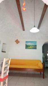 A bed or beds in a room at Trulli da Rosy