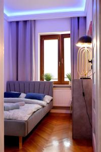 Postel nebo postele na pokoji v ubytování Apartamenty Dłługa 27 Perfekt