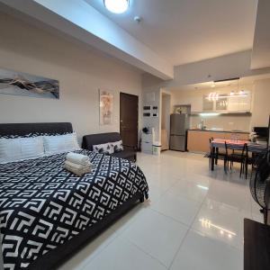 O bucătărie sau chicinetă la A&G Condotel at 101 Newport Across NAIA T3