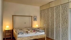 Postel nebo postele na pokoji v ubytování Villa Gartenblick
