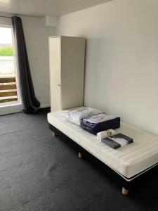 Postel nebo postele na pokoji v ubytování Expats House 10 Stabroek Belgium