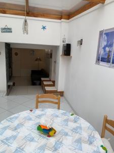 a table with a toy on it in a room at Bray-Dunes avec jardin - 3chambres in Bray-Dunes