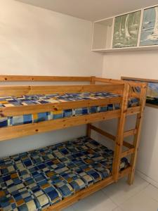 a bunk bed in a room with at Bray-Dunes avec jardin - 3chambres in Bray-Dunes