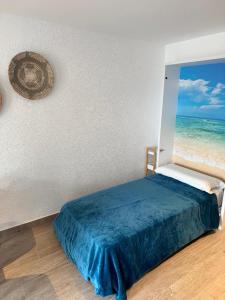 Postel nebo postele na pokoji v ubytování Loft amb vistes al mar by Apartaments La Catifa
