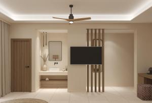Telewizja i/lub zestaw kina domowego w obiekcie Τhe Noverian Antama Organic Beach Resort Chania