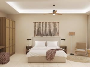 Łóżko lub łóżka w pokoju w obiekcie Τhe Noverian Antama Organic Beach Resort Chania
