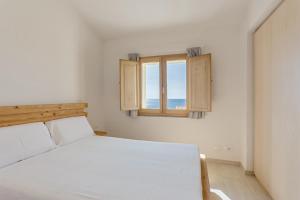 Ένα ή περισσότερα κρεβάτια σε δωμάτιο στο Casa Margarita