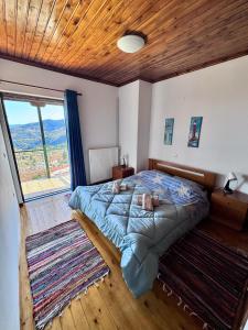 Postel nebo postele na pokoji v ubytování Casa de PavL-1