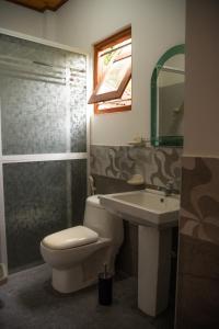 Koupelna v ubytování Rose Blossom Ayurvedic Spa & Guesthouse Mirissa