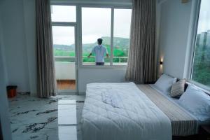 Postel nebo postele na pokoji v ubytování Pinnacle Resort Vagamon