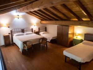 Postel nebo postele na pokoji v ubytování Agriturismo borgo del mincio