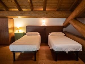 Postel nebo postele na pokoji v ubytování Agriturismo borgo del mincio