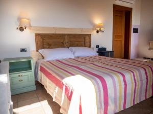 Postel nebo postele na pokoji v ubytování Agriturismo borgo del mincio