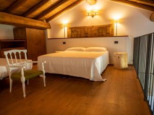 Postel nebo postele na pokoji v ubytování Agriturismo borgo del mincio