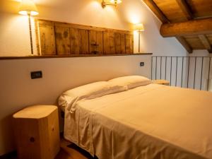 Postel nebo postele na pokoji v ubytování Agriturismo borgo del mincio