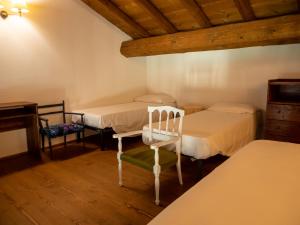 Postel nebo postele na pokoji v ubytování Agriturismo borgo del mincio