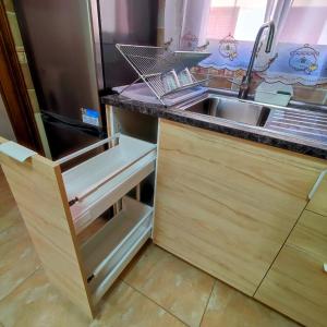a kitchen with a sink and a counter top at Duplex Elegant in Genovés +76 photos