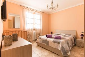 Posteľ alebo postele v izbe v ubytovaní Il Poggiolo + 32 fotografií