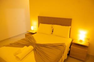 Una cama o camas en una habitación de Edificio Victor
