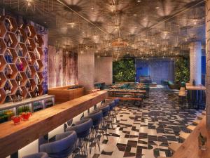 Posezení v ubytování Mövenpick Hotel & Apartments Ghala Muscat