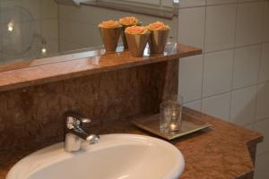 Koupelna v ubytování Hotel Csejtei