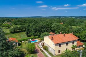 an aerial view of a house with a swimming pool at Casa Martina by Briskva in Šumber