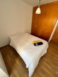 En eller flere senge i et værelse på Cute and Cosy Room