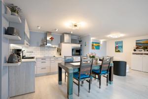 Φωτογραφία από το άλμπουμ του Häuser am See σε Königs Wusterhausen +26 φωτογραφίες