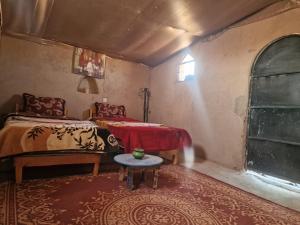 Postel nebo postele na pokoji v ubytování Camel House camp