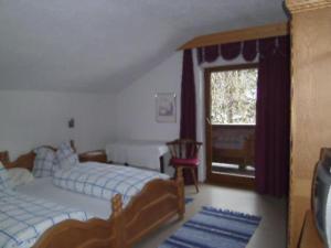 Letto o letti in una camera di Ferienwohnung Kirchbrücke