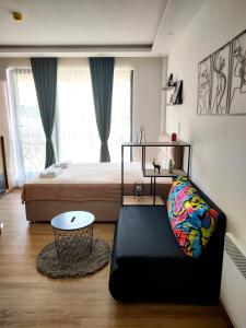 Postel nebo postele na pokoji v ubytování Planinski kutak Residence Hill