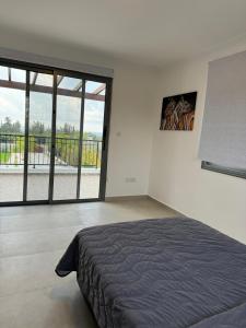Postel nebo postele na pokoji v ubytování Villa Paradiso