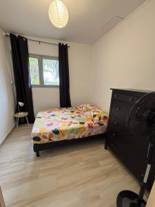Postel nebo postele na pokoji v ubytování La Villa du Voyageur
