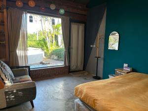 Fotografie z fotogalerie ubytování 大光畫莊庭院 v destinaci Hengchun Old Town