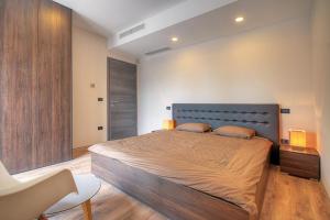 Voodi või voodid majutusasutuse Villa Onyx for 12 people near Porec with 65 private pool and jacuzzi toas