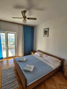 Ein Bett oder Betten in einem Zimmer der Unterkunft Apartments Josi