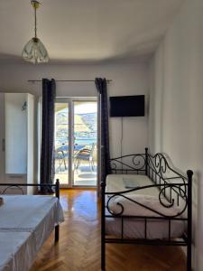 Ein Bett oder Betten in einem Zimmer der Unterkunft Apartments Josi