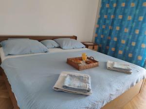 Ein Bett oder Betten in einem Zimmer der Unterkunft Apartments Josi