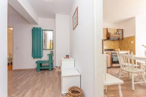 Kuchyňa alebo kuchynka v ubytovaní Apartment Sand