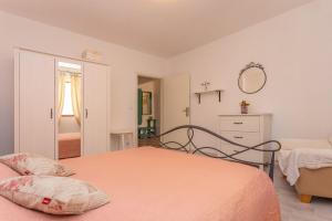 Posteľ alebo postele v izbe v ubytovaní Apartment Sand