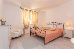 Posteľ alebo postele v izbe v ubytovaní Apartment Sand
