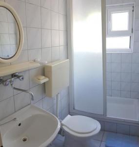 Koupelna v ubytování Apartments Jope