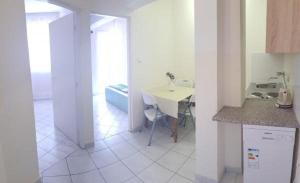 Kuchyň nebo kuchyňský kout v ubytování Apartments Jope