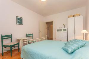Posteľ alebo postele v izbe v ubytovaní Apartment Sand